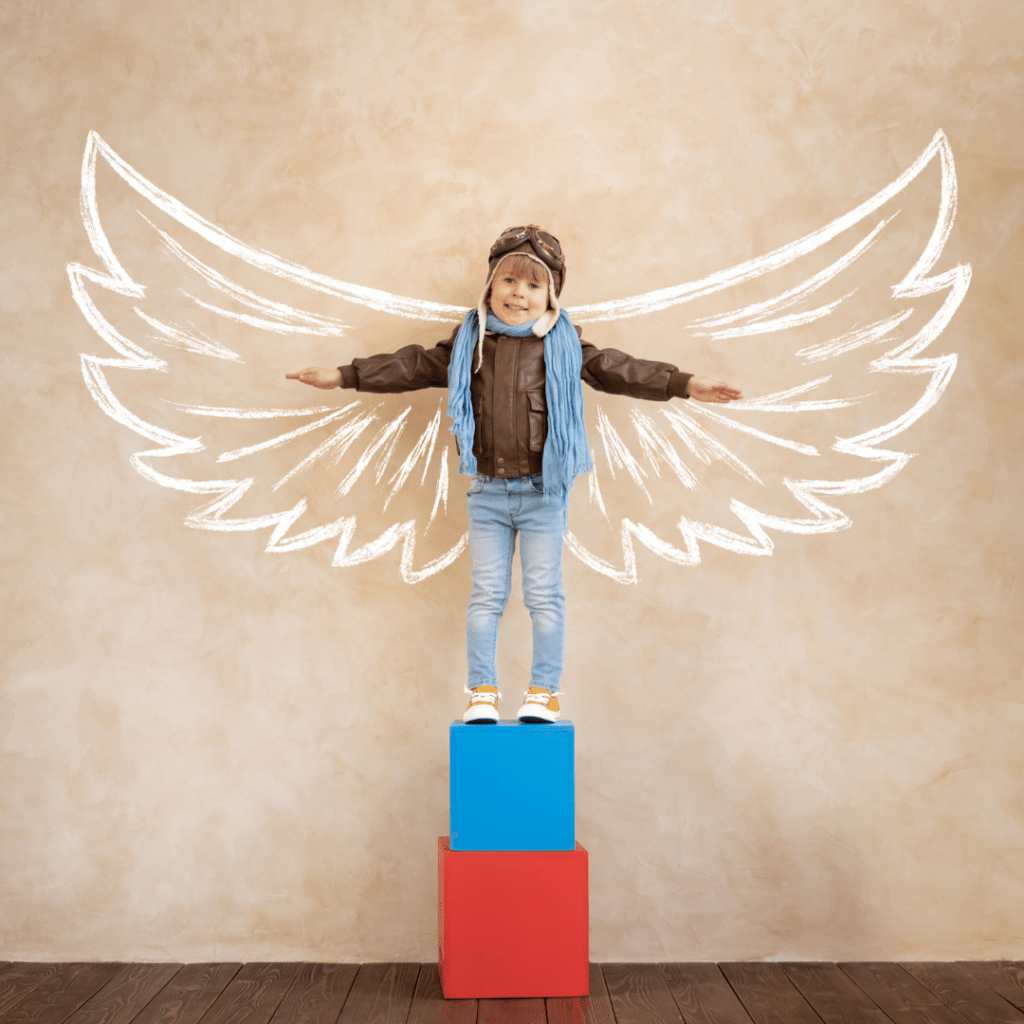 Boy with Wings on Boxes